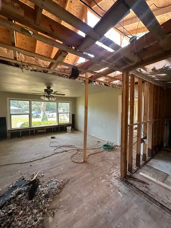 A room gutted to the studs during a restoration